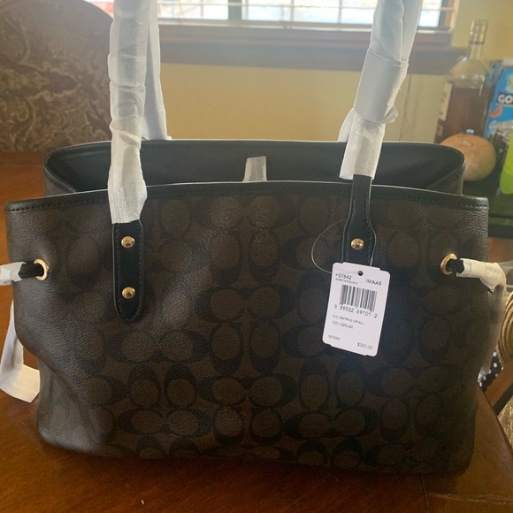 Coach - Picture 2 of 3